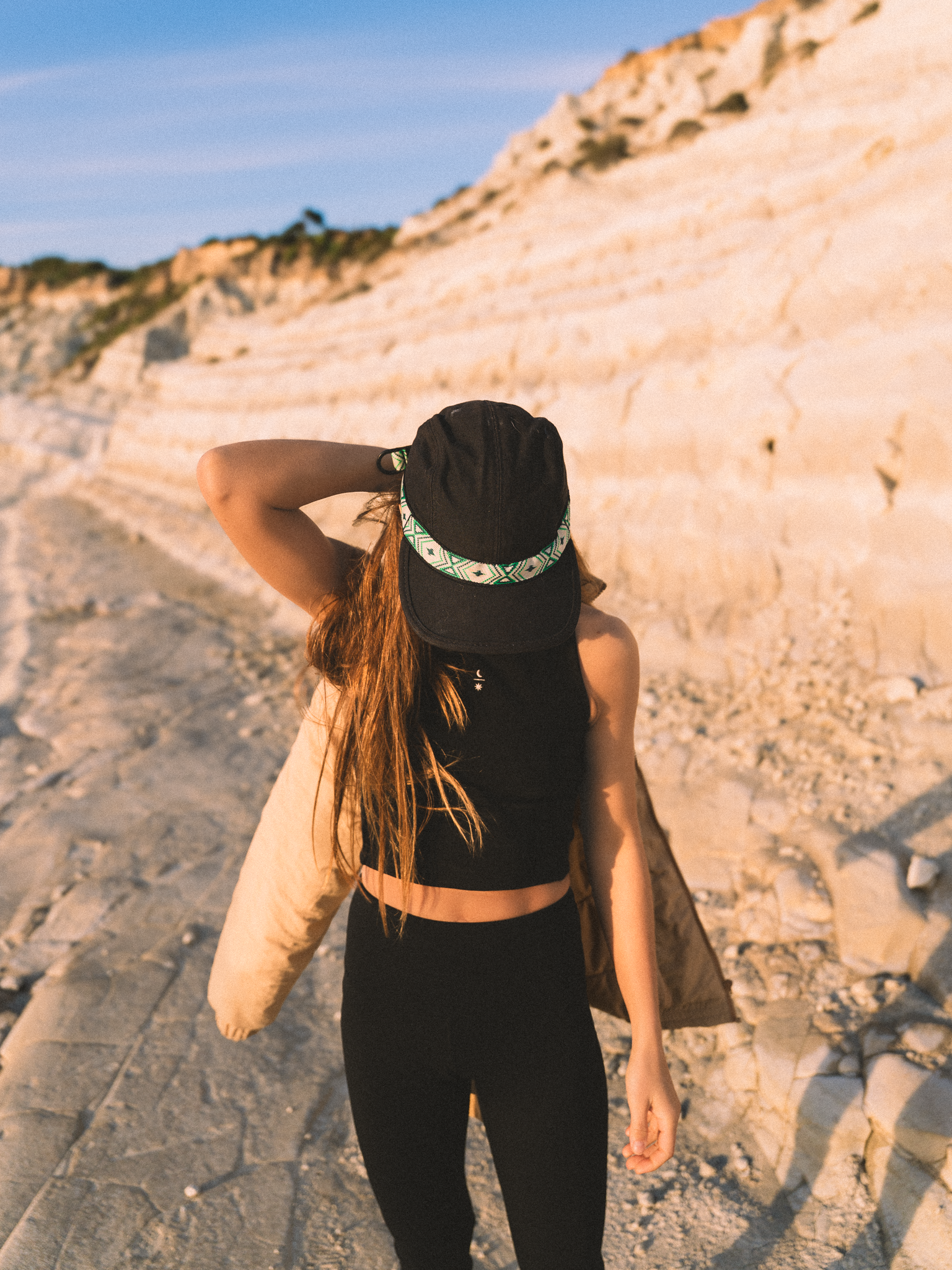 Female model wearing the Ainé activewear bundle - sustainable yoga and pilates outfit with Swiss design